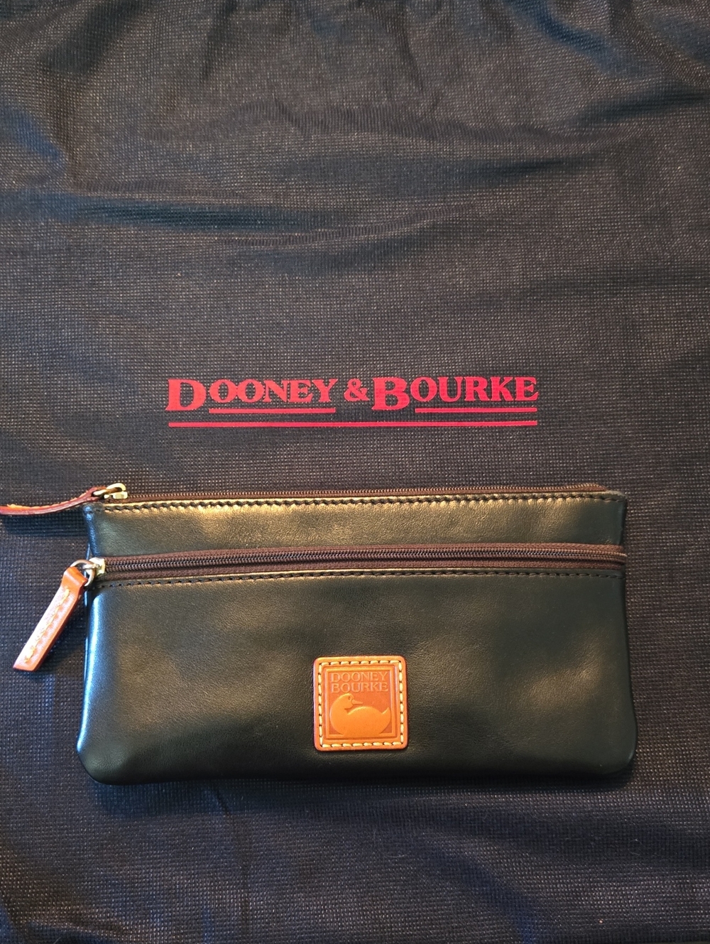 Dooney & Bourke Black Leather Zip Pouch with Tan Trim